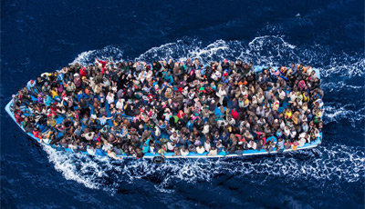 Naval helicopter photo of rescue of migrants of coast of Sicily by Italian navy